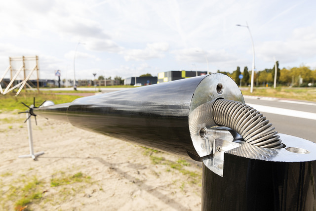a fish on a wooden post