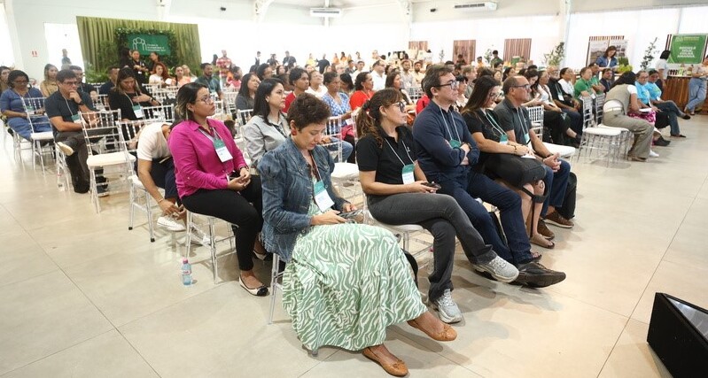 a group of people sitting in chairs