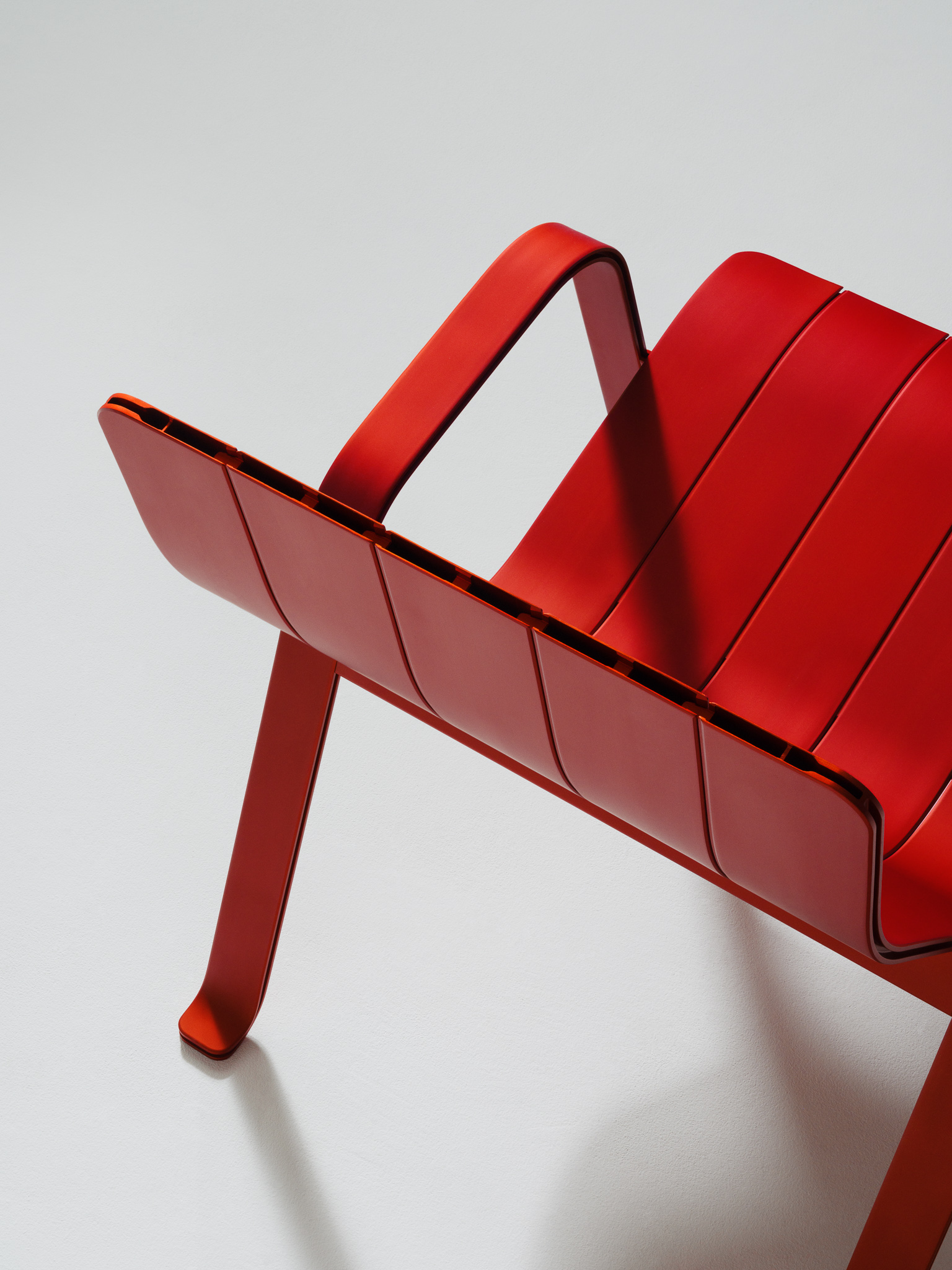 A red aluminium chair