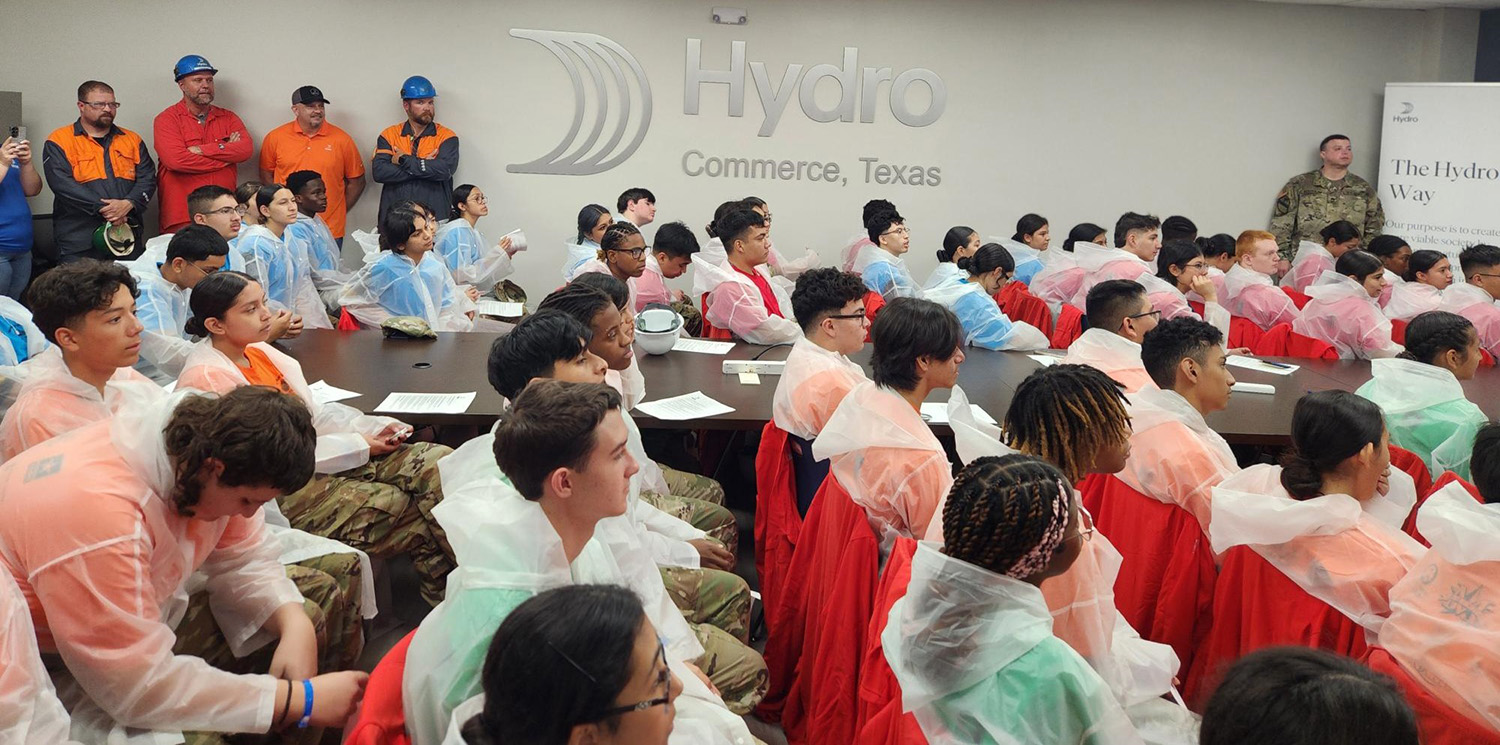 a group of people sitting in a room