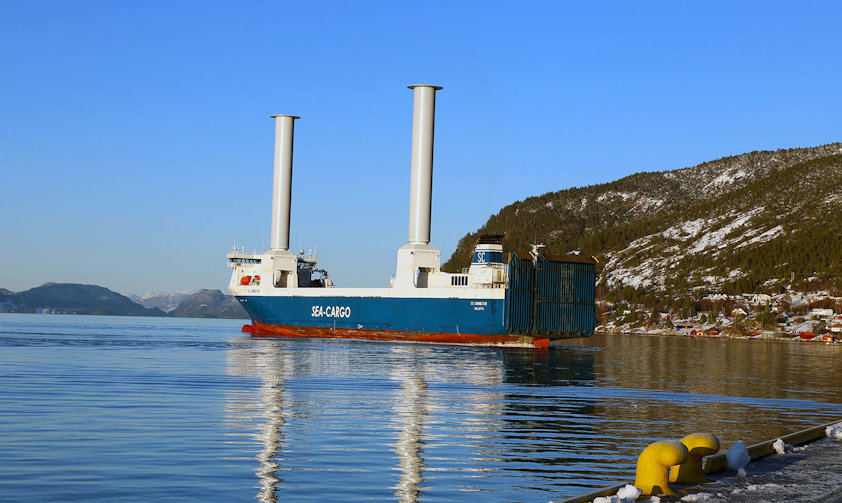 a large blue and white boat in the water