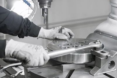 a person working on a machine