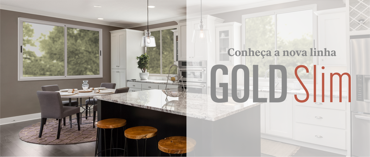 a kitchen with a bar and chairs