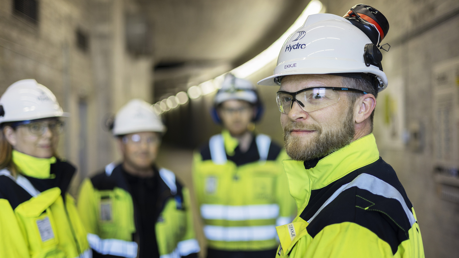 a group of men wearing helmets
