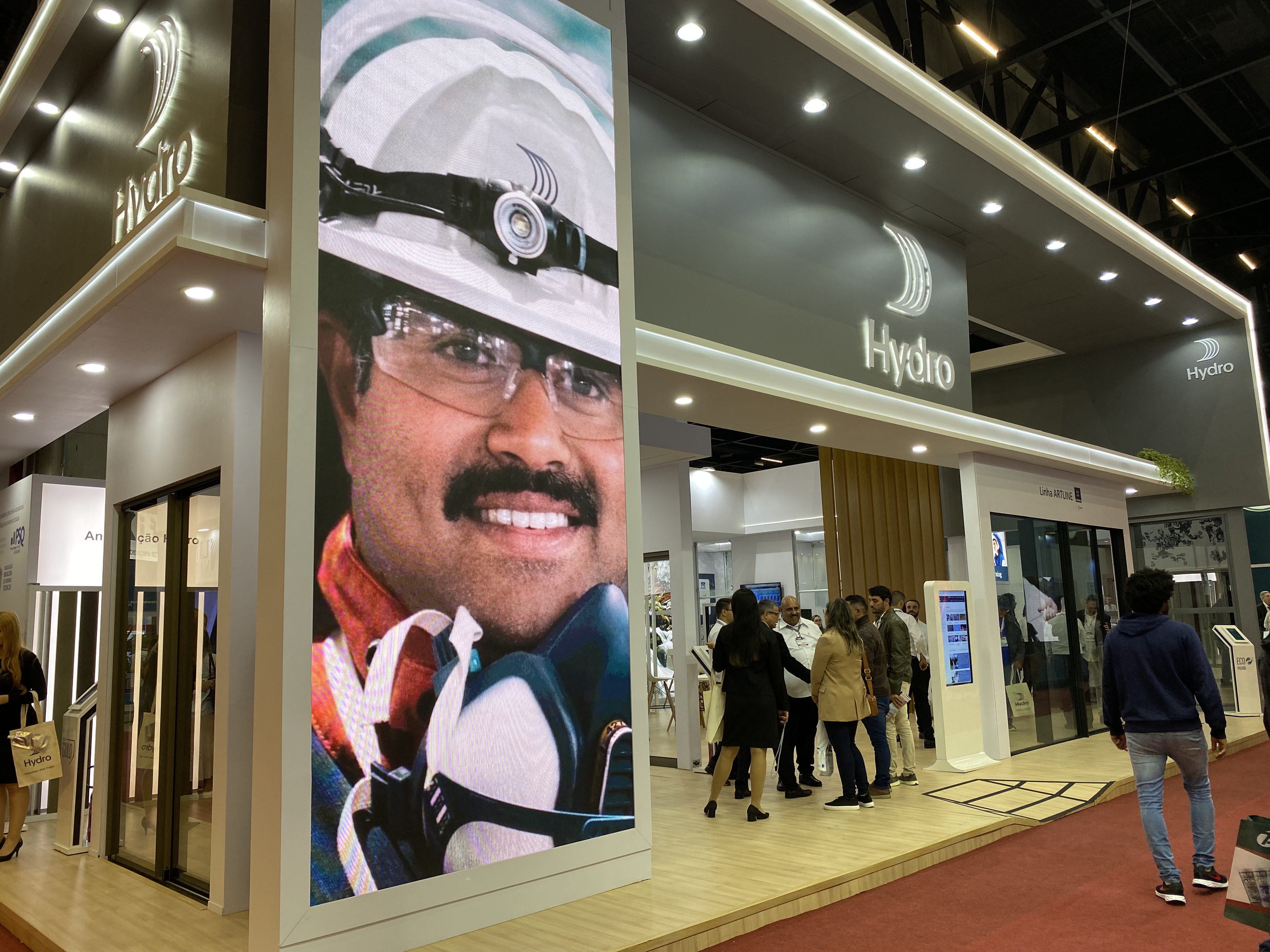 a man's face on a poster in a building